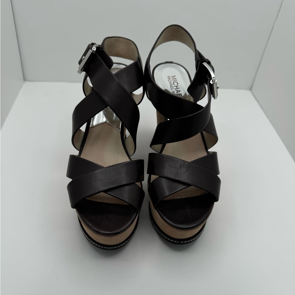 Brown Micheal Kors leather/suede bottom wedges.